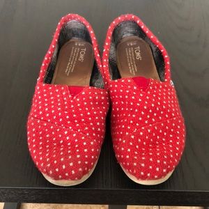 Red polka dot TOMS.